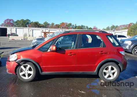 2009 Suzuki Sx4 Technology z USA, uszkodzony, nr VIN JS2YB413895100110